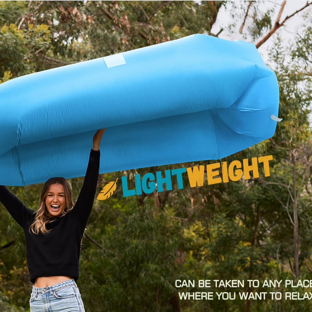 Woman holding an Inflatable Lounger Sofa in a lightweight design, ideal for camping and outdoor relaxation.