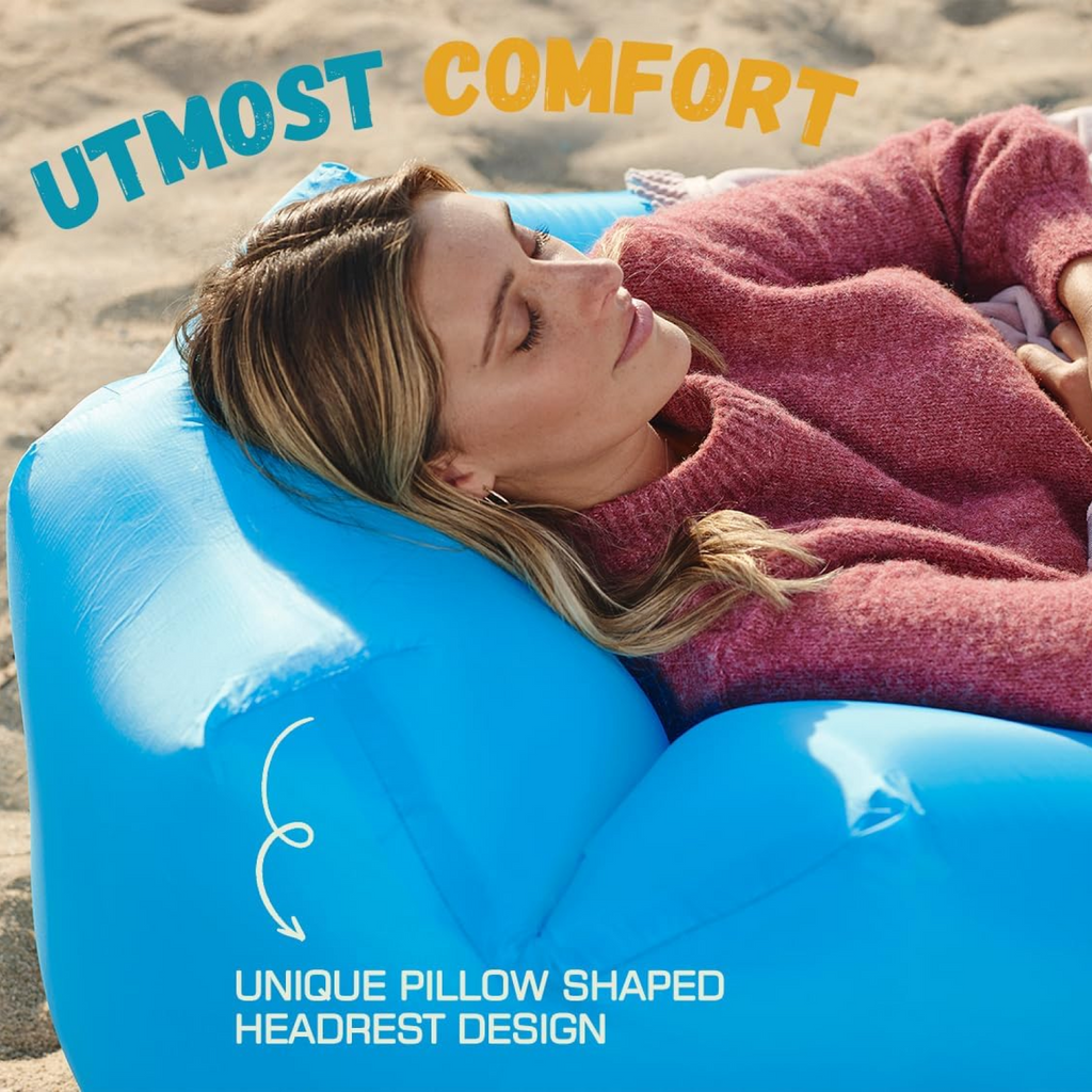 Woman relaxing on an Inflatable Lounger Sofa demonstrating utmost comfort with a unique pillow shaped headrest design.