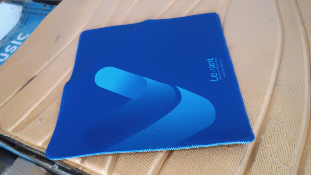 Gaming Mouse Pad featuring a blue abstract design, waterproof and skid resistant, ideal for gaming and office use.